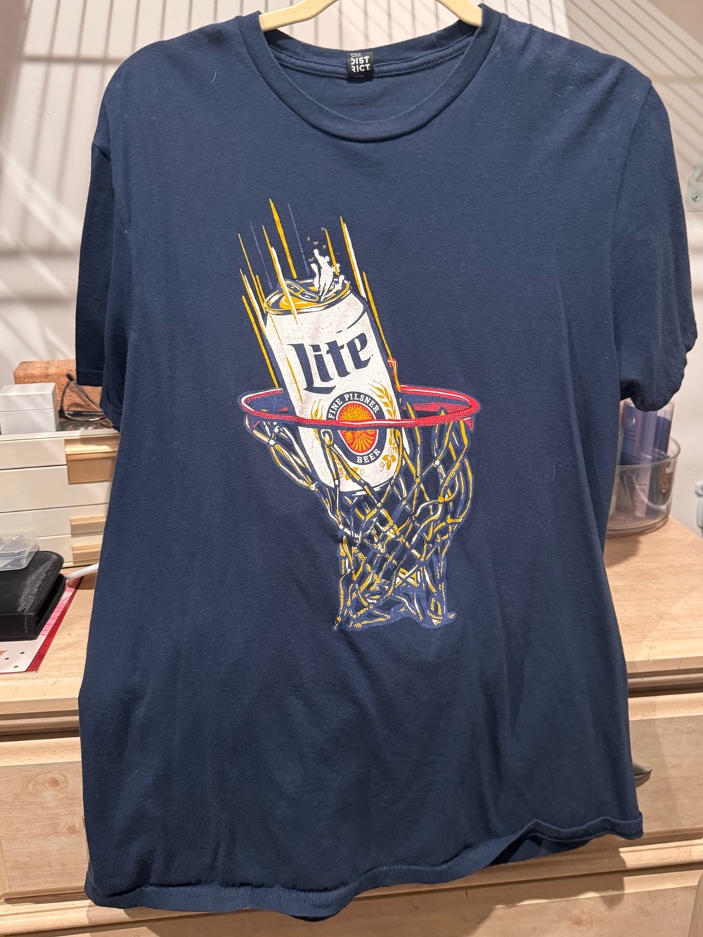 District Navy Tee with Basketball Hoop and Can Graphic